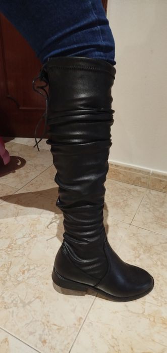 Bota cano alto   .