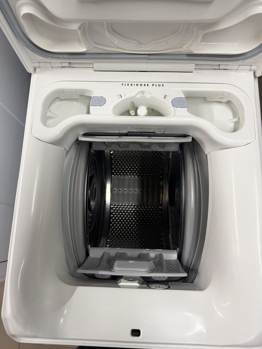 Пральна машина з вертикальним завантаженням AEG