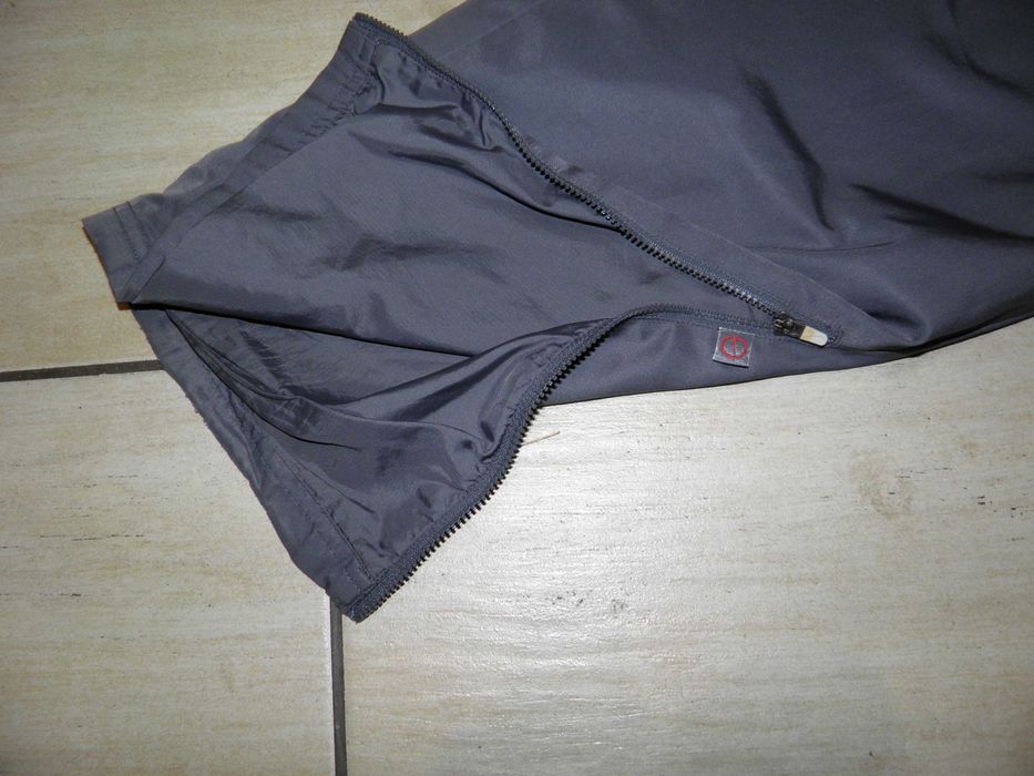 Spodnie dresowe damskie Nike r M .