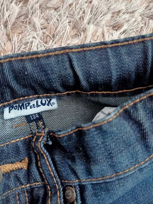 Młodzieżowe spodnie jeansy pomp de lux rozmiar 134