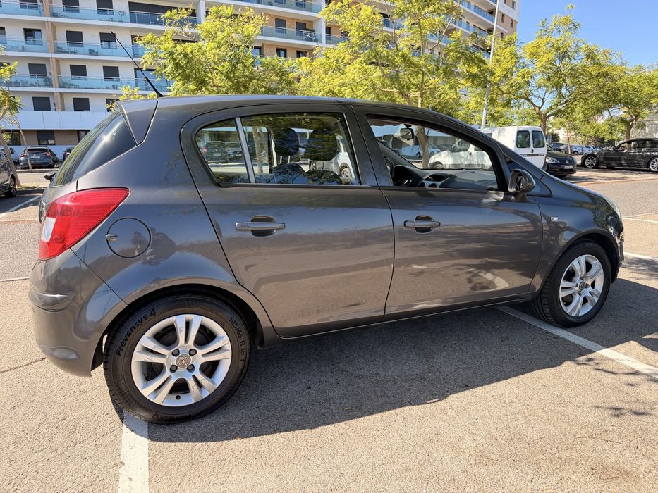 Opel Corsa 1.2 85cv | 2012 | 95.700 km foto 4