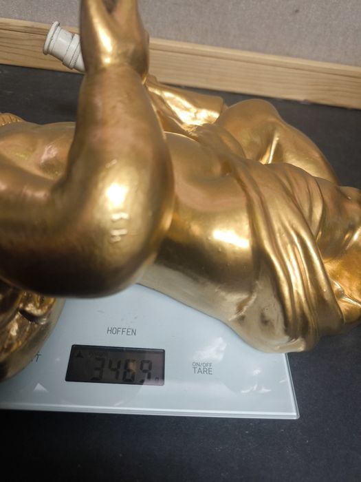 Aplique de Parede Anjo Dourado 
Dê um toque de elegância clássica e so