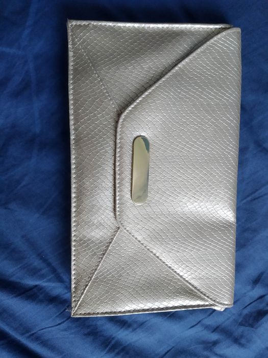 Elegancka kopertówka Avon złota torebka