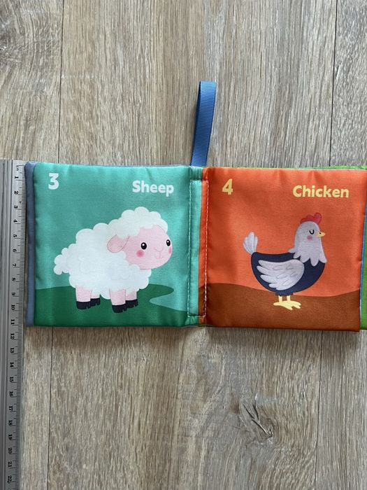 Книжка шуршалка  тваринки нова