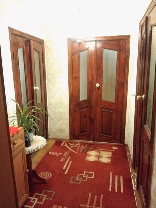 Продам квартиру двоповерхову,гараж,погріб,город