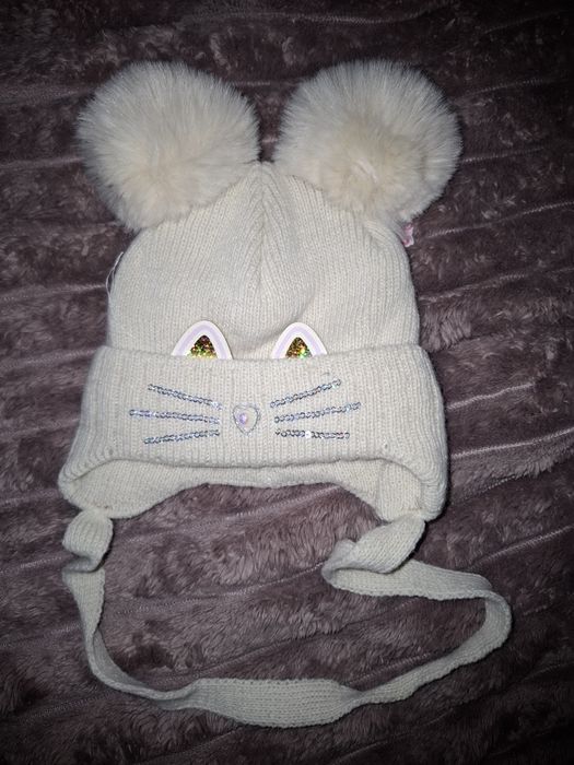 Мила зимова шапочка