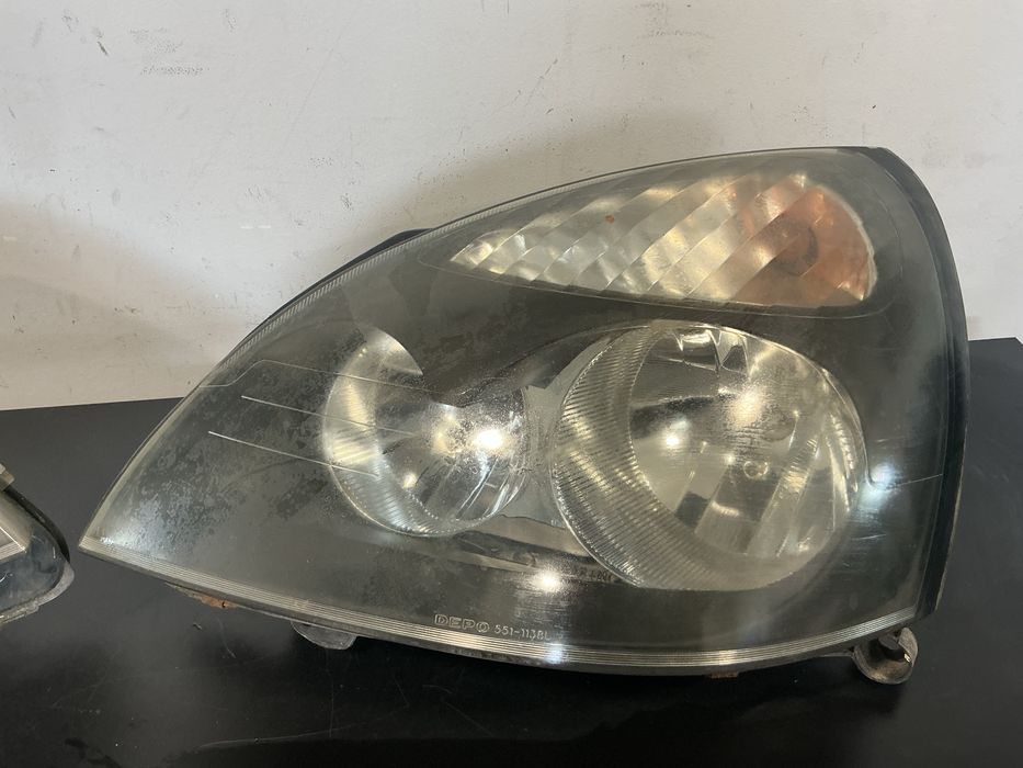 Farol /ótica Renault Clio II Ano Fundo escuro