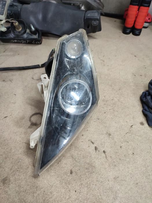 Lampa przód, reflektor lewy Peugeot Jet Force