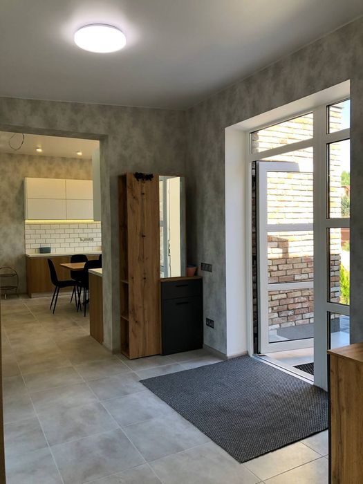 Продаётся новый дом в Обуховке в закрытом охраняемом городке с ремонто