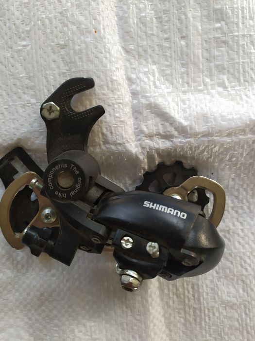 Задний переключатель скоростей, компаньела Shimano.