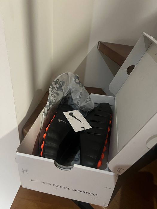 Тапки nike mind 001