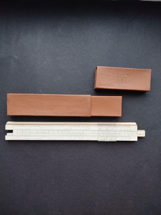 Логарифмічні лінійки 76-77 роки дерево/пластик.