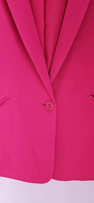 Blazer fucsia com manga arrepiada
