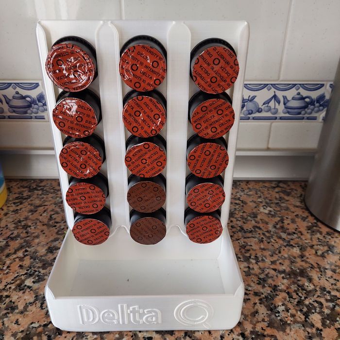 Porta capsulas delta