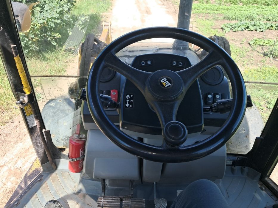 Koparko ładowarka cat 428 e