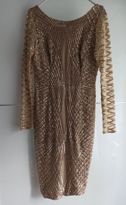 Sprzedam złotą, zdobioną sukienkę