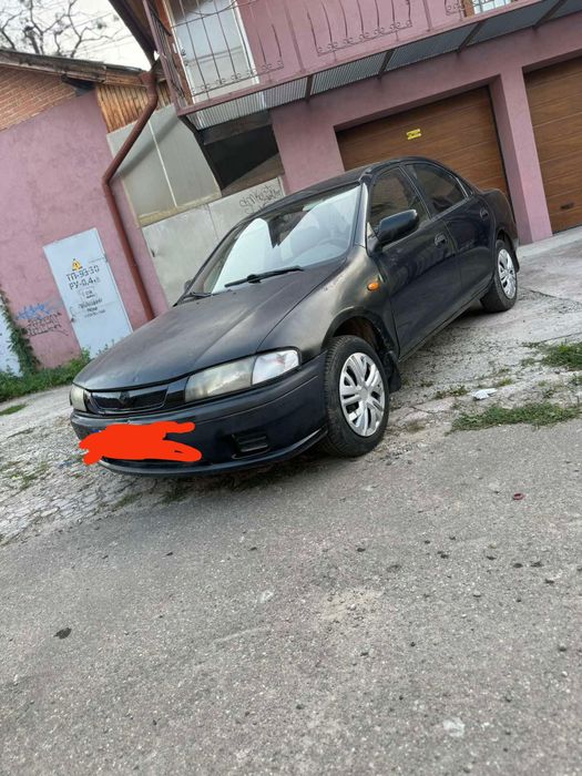 Mazda 323 f ba Бампер.