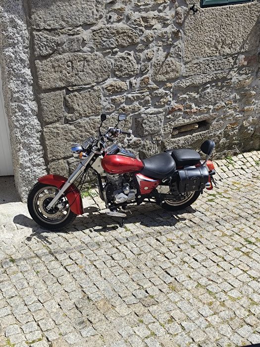 Mota 125 usada com se vê nas fotos