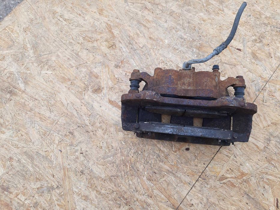 Zacisk Chrysler Grand Voyager 11-21r Dodge Caravan RT RH