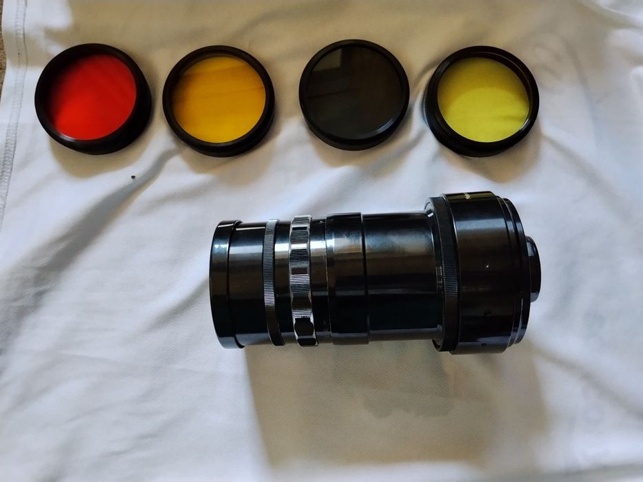 Фотооб'єктив 70 мм