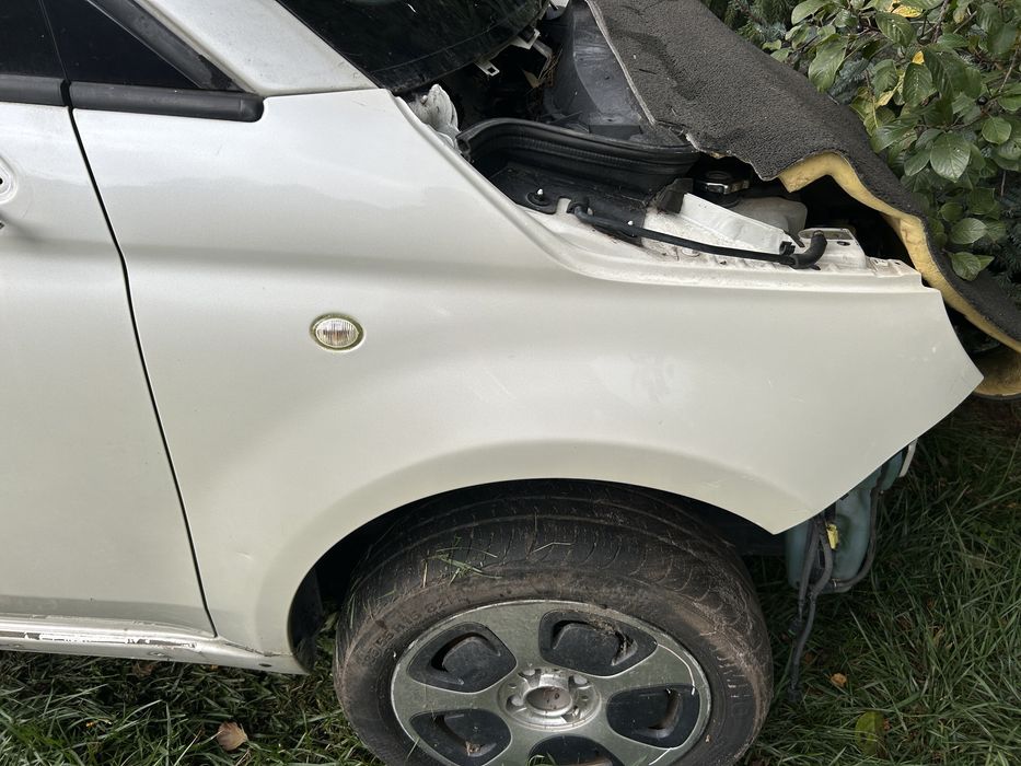 Fiat 500e 13-19r przedni błotnik lewy prawy błotniki biała perła