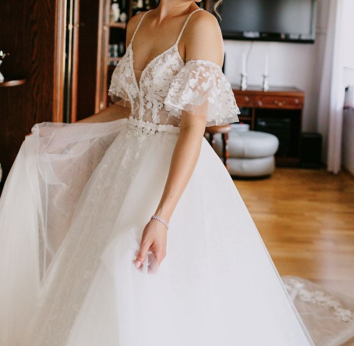 Suknia ślubna z tremen odpinanym