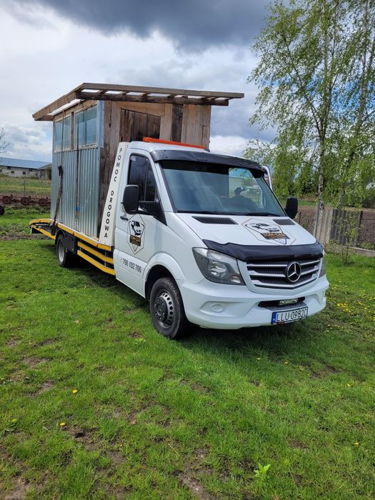 Auto pomoc_Auto holowanie_Laweta 24_pomoc drogowa _Wynajem
