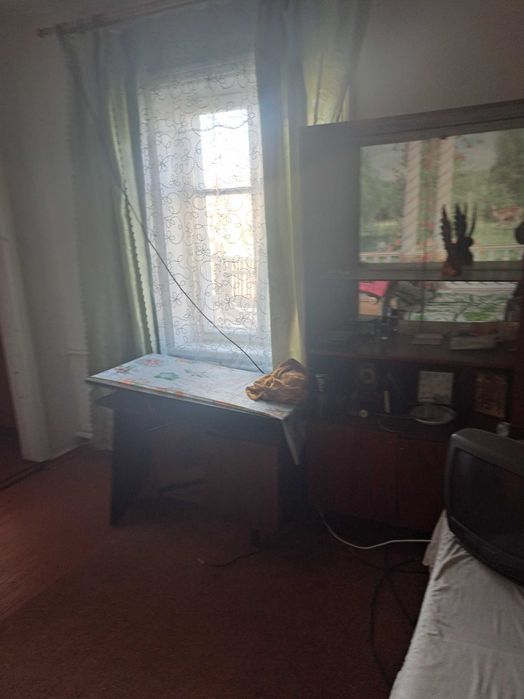 Продам 1/2 будинка