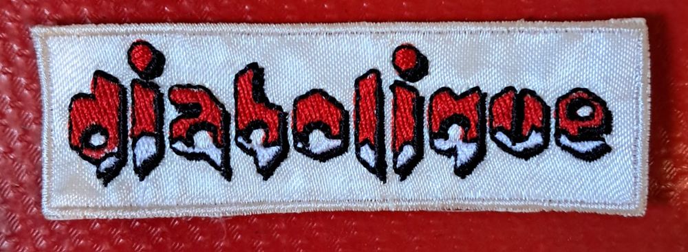 Diabolique, emblema de pano, 9 cm. x 3 cm.