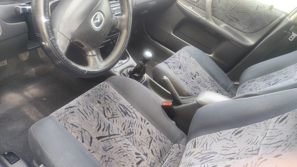 Mazda 323f 1.5 gasolina/gpl