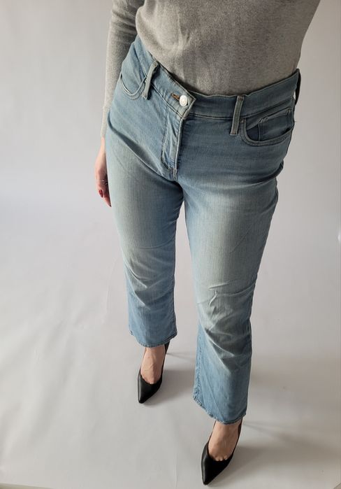Jasne jeansy spodnie bootcut levis średni stan dzwony M 38