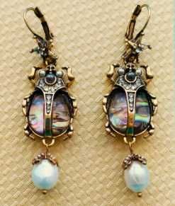 Brinco inseto estrela pérola - Portes Grátis