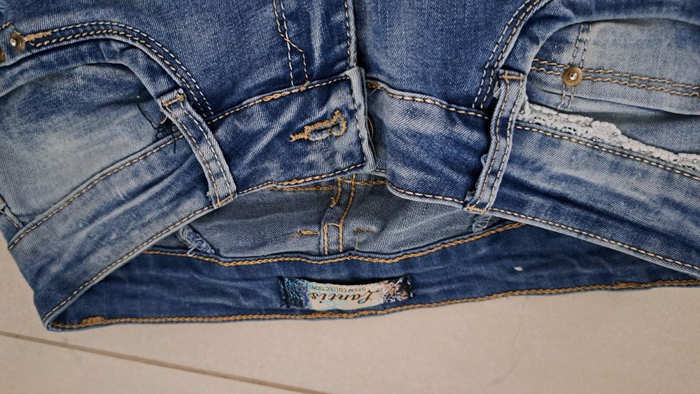 Spodnie dżinsy wycierane 36 s