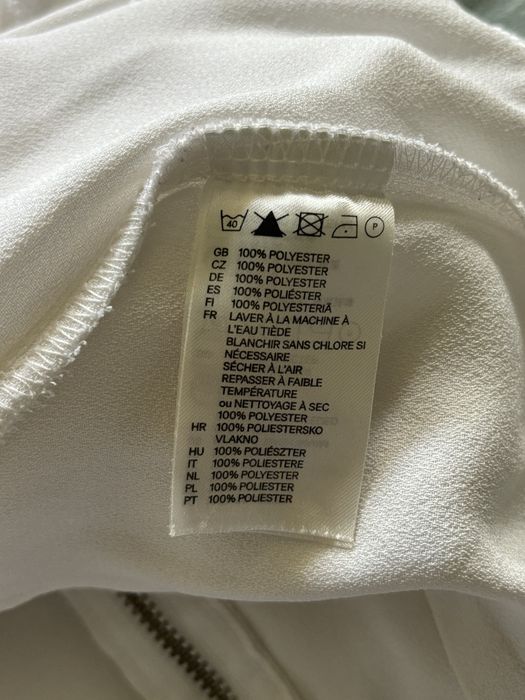 Biała bluzka z falbanką H&M