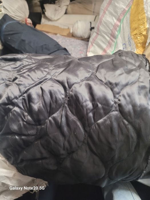 Тканина стьобана на холлофайбері.