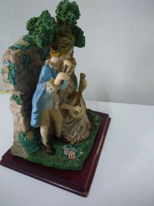 Casal em cerâmica