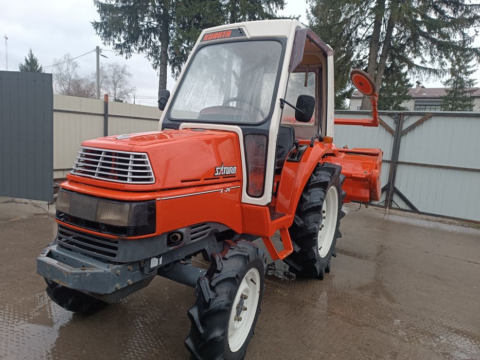 Японський мінітрактор . Трактор Кубота.