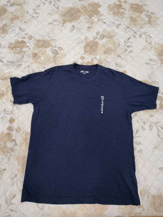T-shirt UT tam. L em excelente estado.