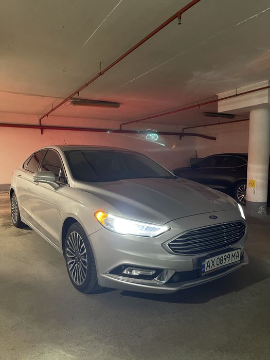 Ford Fusion Titanium •