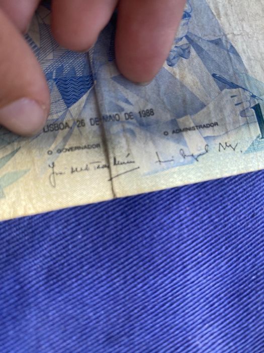 7 Notas de 100 escudos