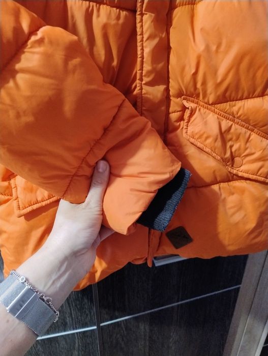 Zimowa kurtka chłopięca r.158 Reserved pomaranczowa