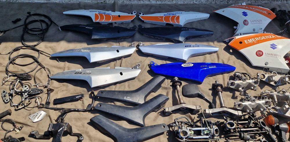 Suzuki DL650 V STROM zegar owiewka boczek wypełnienie osłona linka oś