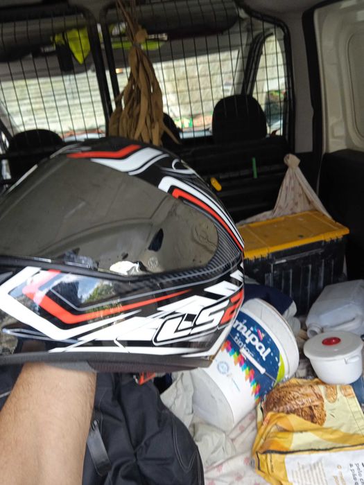 Capacete e casaco de Motard