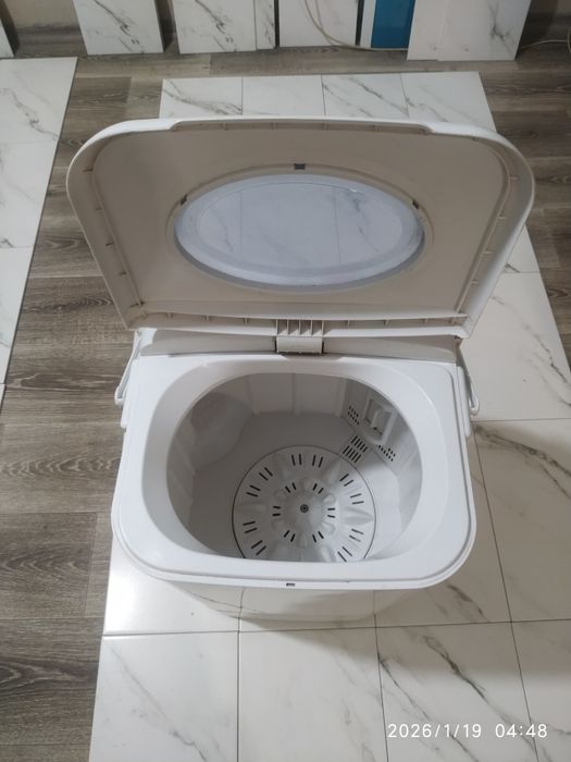 Продам стираную машинку малютка