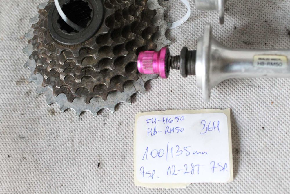 BUDŻET PIASTy rowerowe 7s 100/135mm 36H + kaseta hyperglide DB2