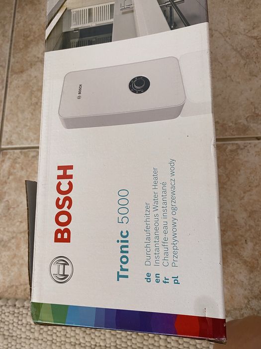 Esquentador elétrico instantâneo da gama Tronic 5000 da Bosch - ESQ BOSCH ELECT. -TR5001 11/13ESOB