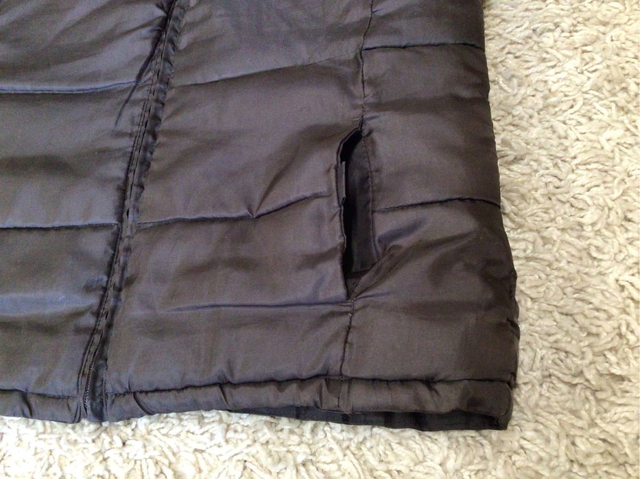 Жилетка теплая.