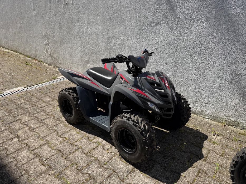 Moto 4 Masai como nova