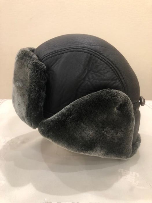Шапки ушанки та норкова