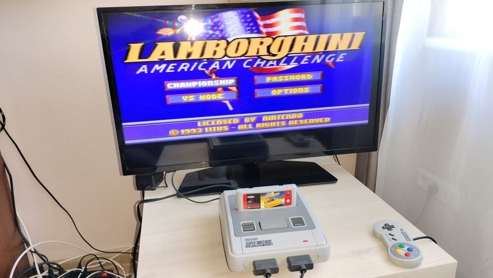Nintendo SNES + kolekcja 15 gier w tym SPARKSTER